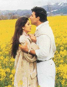 According to the song Surkh jode mein... Shilpa Shetty is said to be wearing red while she sports blue