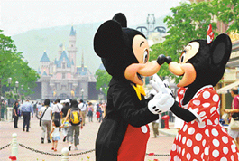 Mickey Mouse and Minnie Mouse play on the main street at Hong Kong Disneyland on Sunday, one day before its official opening.  Disneys first-ever vacation resort in China, it has fuelled widespread protests.