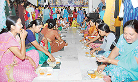 ISKCON devotees partake Krishna cuisine on the occasion of Radha Ashtami at the Hare Krishna Dham in Sector 36, Chandigarh, on Sunday.