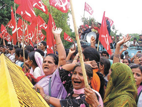 CPM activists demonstrating against water scarcity at the Delhi Secretariat in the Capital on Monday