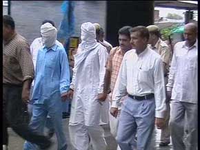 The police produces the three accused in the case of conspiracy to kill Mr Bhajan Lal and Baba Bhaniarawala in court in Kaithal on Monday.