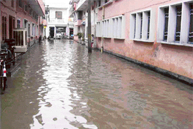 Flooded road along Jain Muni Shri Kundan Kanya Mahavidyalya in Ahmedgarh on Monday