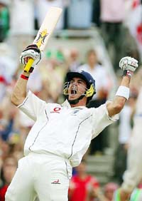 Englands Kevin Pietersen celebrates on completing his century against Australia on the final day of the fifth Ashes Test at the Oval in London on Monday