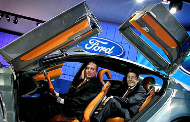 Ford Chairman (Europe) Lewis Booth and Bernhard Mathes, Chairman of Ford (Germany) sit inside the design study IOSIS during a preview at the car show in Frankfurt, Germany, on Tuesday