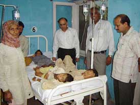 Students of Government Primary School, Pinjupura, who consumed poisonous food in school, being treated at Civil Hospital, Kaithal, on Tuesday. 