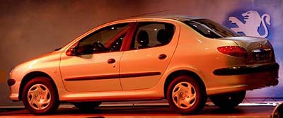 A Peugeot 206 Sedan is shown during a launching ceremony at the Iran Khodro automaker complex west of Teheran on Wednesday