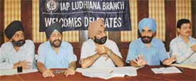 Dr S.S. Luthra, president, and Harinder Singh, general secretary, Indian Academy of Paediatrics, address a news conference in Ludhiana on Thursday