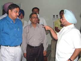 The Chairman of the Punjab Finance Commission for Panchayat and Municipals, Mr A.S. Chatha, interacts with the Deputy Commissioner, Mr Rahul Bhandari, in Bathinda on Wednesday.