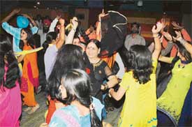 Students of the Swami Vivekanand Institute of Paramedical Sciences dance at a farewell party