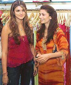 Designer Nandita Mahatani poses with model Rhea Pillai at the opening of Nanditas international fashion store, Ananya, in Mumbai