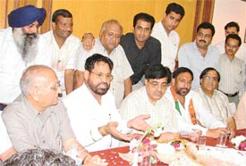 Mr Satpal Puri  talks to mdeiapersons after joining the BJP in Ludhiana on Saturday