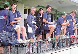 The Australian under-19 team waits for the rain to stop at the PCA Stadium, Mohali, on Sunday