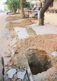 A trench,which has been dug by a telecom firm in Sector 15-D of Chandigarh, poses a risk to residents lives