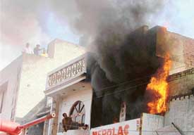 The paint shop that caught fire on Shingar Road in Ludhiana on Sunday