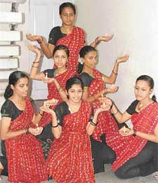 Keralite girls present a dance item during Onam celebrations by the Kerala Kalavedi in Ludhiana on Sunday