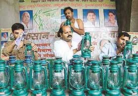 Party workers from the Rashtriya Janata Dal (RJD) clean lanterns as they prepare for campaigning in Patna on Sunday. Elections in Bihar are scheduled to take place from October 18. Lanterns are the symbol of the RJD. 