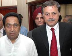 Union Commerce & Industry Minister Kamal Nath (left) is accompanied by Pakistans Commerce Minister Humayun Akhtar Khan as they arrive to attend a meeting organised by Ficci in New Delhi on Monday. Ficci President Onkar S. Kanwar (centre) is also seen in the picture.