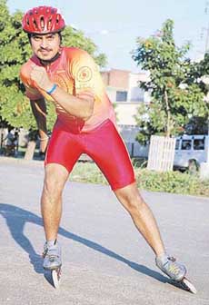 Harkiran Singh practises on the road dividing Sector 43-44 in Chandigarh.