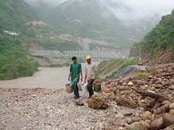 Due to heavy rains the road on both sides of the bridge (Maitri Setu), which was constructed by the Kol Dam project authorities, about 35 km from Sundernagar, was damaged. 