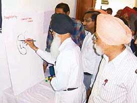 Gurdwara Godri Sahib Baba Farid Society chief Inderjit Singh Khalsa at the inauguration of a state-level painting workshop in Faridkot on Monday.