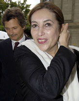 Former Pakistani Prime Minister Benazir Bhutto (right) and Swiss lawyer Alex Reymond arrive at the Palais de Justice in Geneva, Switzerland on Monday. 