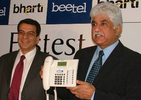 Mr Rakesh Bharti Mittal, Vice-Chairman and Managing Director, Bharti Teletech, shows the millionth phone manufactured by the companys facility in Hambran, Ludhiana.