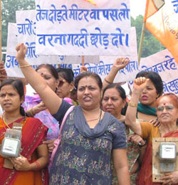 BJP activists demanding the removal of fast running electronic meters in the Capital on Thursday. 