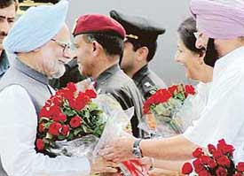 Bouquets of good wishes: Prime Minister being welcomed by Punjab Chief Minister Amarinder Singh and senior Congress leader Ambika Soni.
