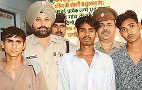 Murder accused in police custody at the Sector 36 police station in Chandigarh on Friday. 