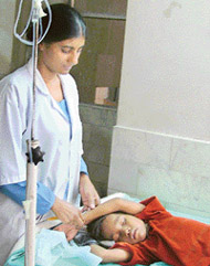 Rajesh Kumar, who is down with diarrhoea, recuperates at a hospital in Ludhiana on Friday