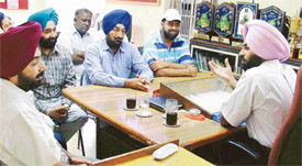 Pargat Singh, Sports Director, Punjab, with sports officers of Ludhiana during a meeting