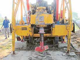 A rotary machine being used for sinking a tubewell in Mahendwani village in place of percussion machine. 
