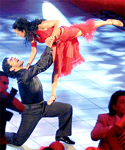 Argentine soccer legend Diego Maradona holds Italian dancer Angela Panico at the end of a samba during the Italian TV show Ballando, Ballando