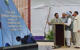 Prime Minister Manmohan Singh talks to officials at the inauguration of the Rajiv Gandhi Chandigarh Technology Park in Chandigarh