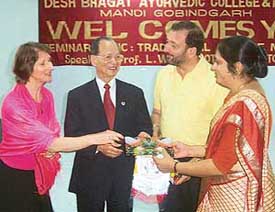 Dr Zora Singh, chairman, Desh Bhagat Group of institutes, honours Australian delegates at a seminar at DB Ayurvedic College and Hospital, Mandi Gobindgarh, on Saturday. 