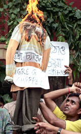Cricket fans burn an effigy of  Greg Chappell in Kolkata on Saturday