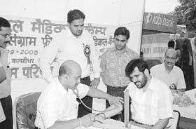 A patient being examined at a health camp organised at Baltana, near Zirakpur