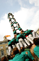 The group, Castellers of Vilafranca, form a human tower at Sant Jaume square during the annual fiestas of La Merce in Barcelona on Sunday