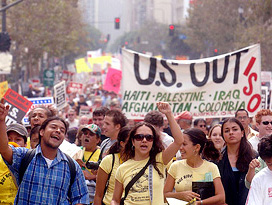 Thousands participate in an anti-war march in downtown Los Angeles on Sunday