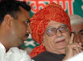 BJP president L.K. Advani  interacts with Capt Abhimanyu, Lok Sabha candidate for Rohtak seat at an election rally on the last day of campaign at New Grain Market, Rohtak on Monday