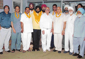 Members of the United Cycle and Parts Manufacturers Association at a meeting of the association where candidates for the forthcoming elections of the association were declared