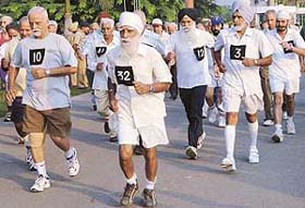 Senior citizens participate in a brisk walk contest organised by the Chandigarh Police and the Chandigarh Senior Citizens Association at the Sukhna lake
