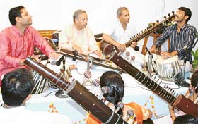 From left: Pt Som Dutt Battu and Pt Virendra Kumar teach students at a five-day workshop on classical music organised by the Department of Music, Punjabi University, Patiala