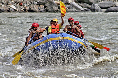Tourists enjoy rafting on the Tista river at Chitrey village, 55 km from Siliguri