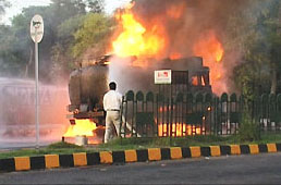 Firefighters trying to put out the blaze at a petrol pump in Gurgaon on Wednesday