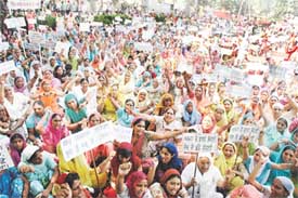 Disciples of Sacha Sauda Dera stage a demonstration in Ludhiana