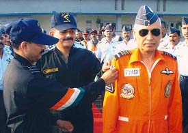 Paratrooping instructor pins para wings after Chief of Air Staff S.P. Tyagi completed his para-jumping syllabus at Hindon Air Base on Wednesday