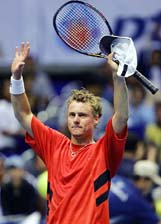 Lleyton Hewitt of Australia exults after defeating Lukas Dlouhy of Czech Republic in the first round of the Thailand Open in Bangkok on Wednesday. Hewitt won 
