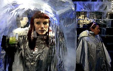 A guest views ice sculptures at the launch of London's first ice bar on Thursday