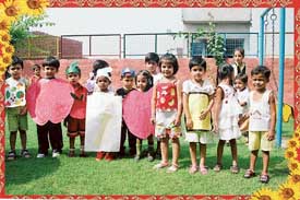 Students of St Joan's Public School celebrate fruit day in Zirakpur
